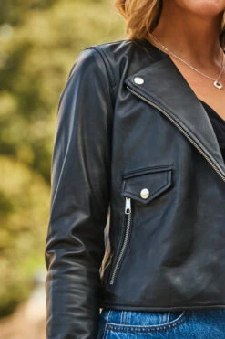 Black Leather Collarless Biker Jacket -MIDI Clothing Shop web 2309 14 s23ol010bk0001 a23tj074bk0001 s23sd010be0010 14 344